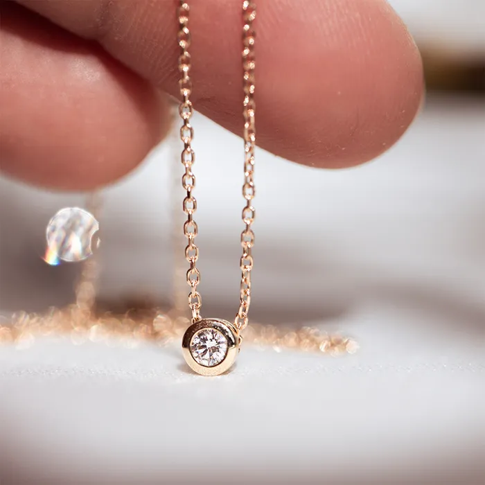 Consider the Wldflwrs Necklaces Round Diamond Bezel Necklace Consider the Wldflwrs Necklaces Round Diamond Bezel Necklace