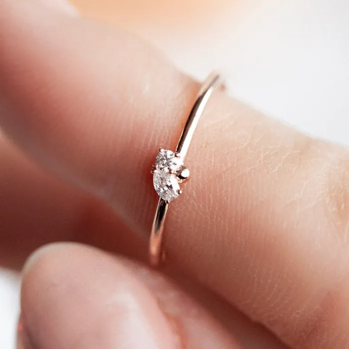 Consider the Wldflwrs Two Stone Pear Cluster Stacker Rings