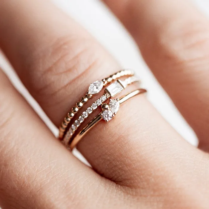 Consider the Wldflwrs Two Stone Pear Cluster Stacker Rings