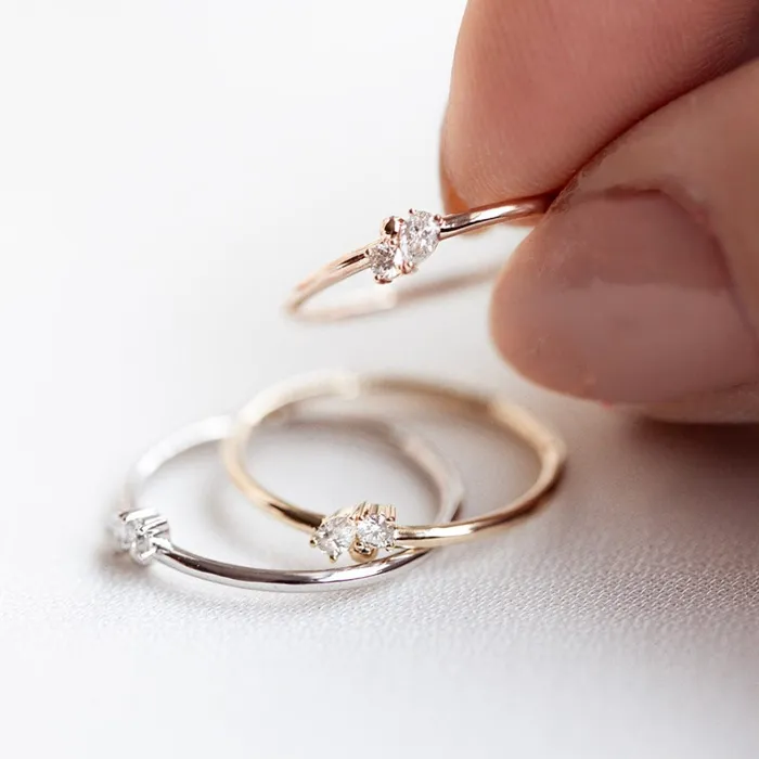 Consider the Wldflwrs Two Stone Pear Cluster Stacker Rings