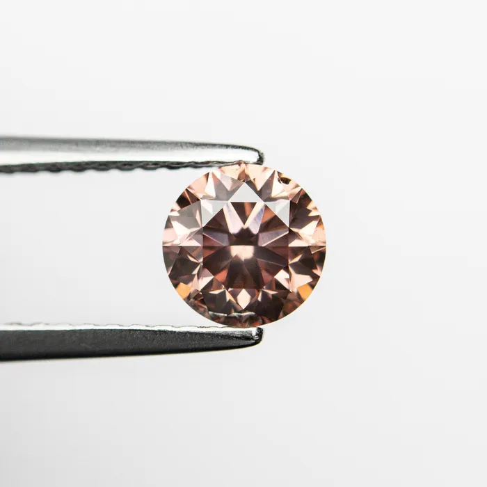 Rings Misfit Diamonds 070ct 551x548x362 GIA SI1 Fancy Deep Orangy Pink Round Brilliant 2414701
